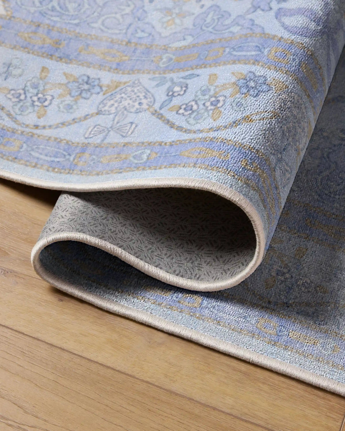 Mazzy Ornamental Blue Rug by Humberto Leon