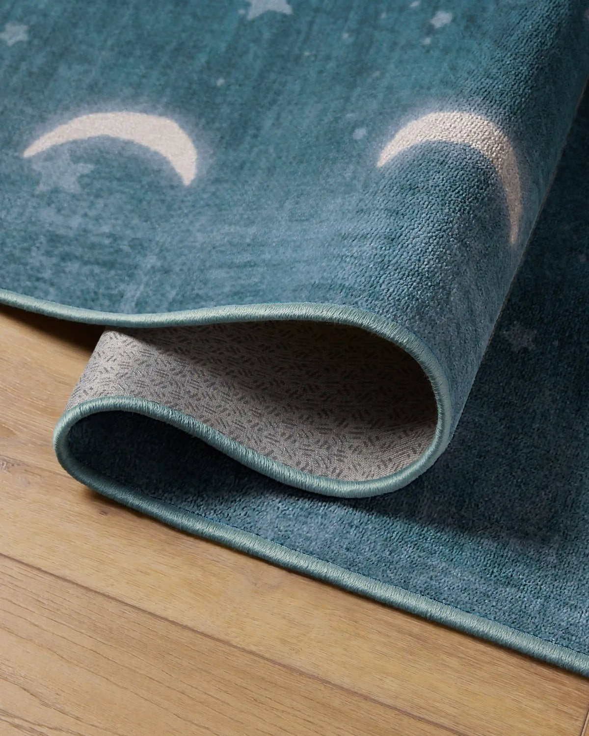 To The Moon And Back Soft Teal Rug by Humberto Leon